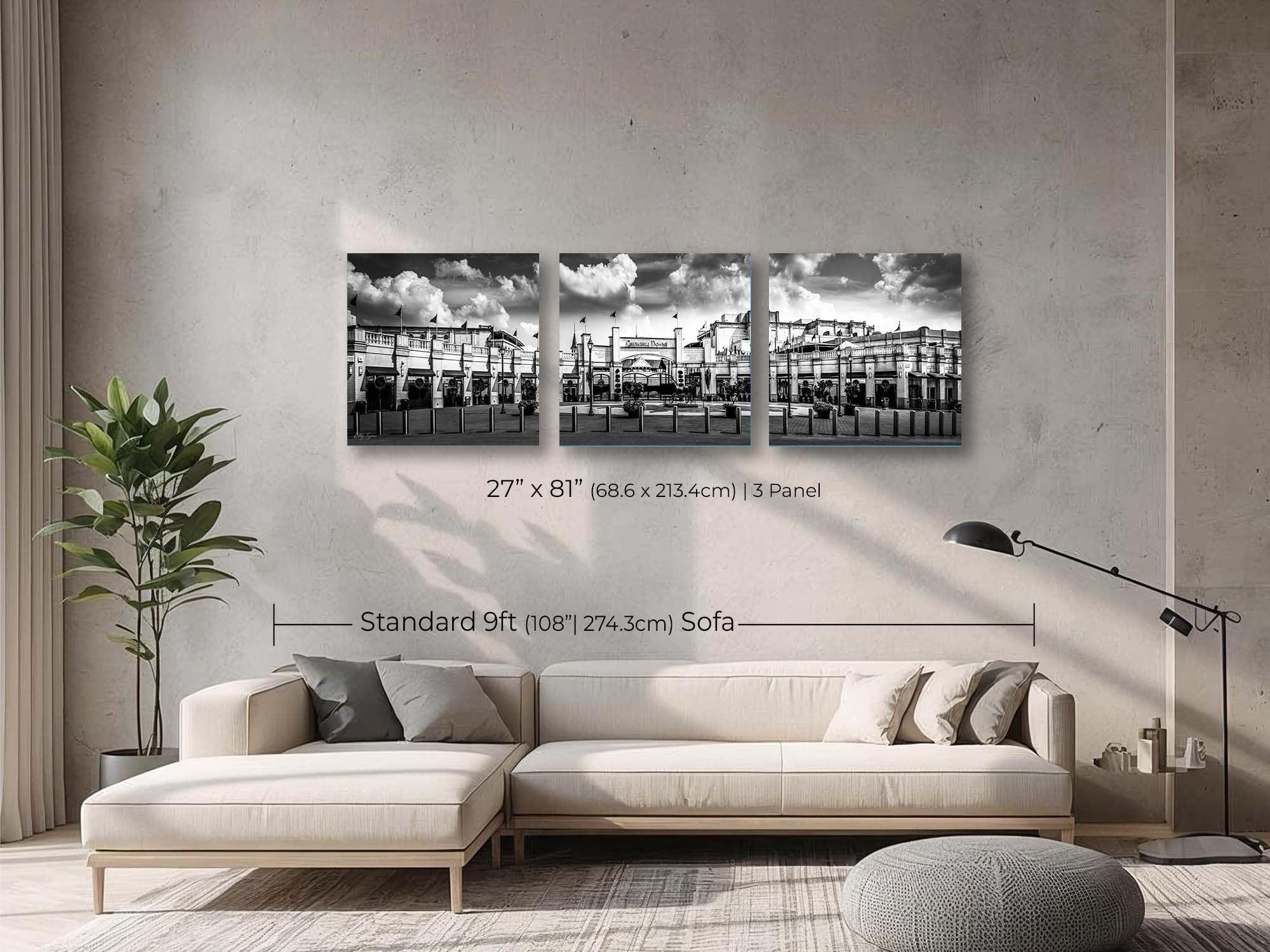 Churchill Downs panoramic black and white fine art print wall art size mockup showing a 27x81 inch 3 panel print above a nine foot sofa