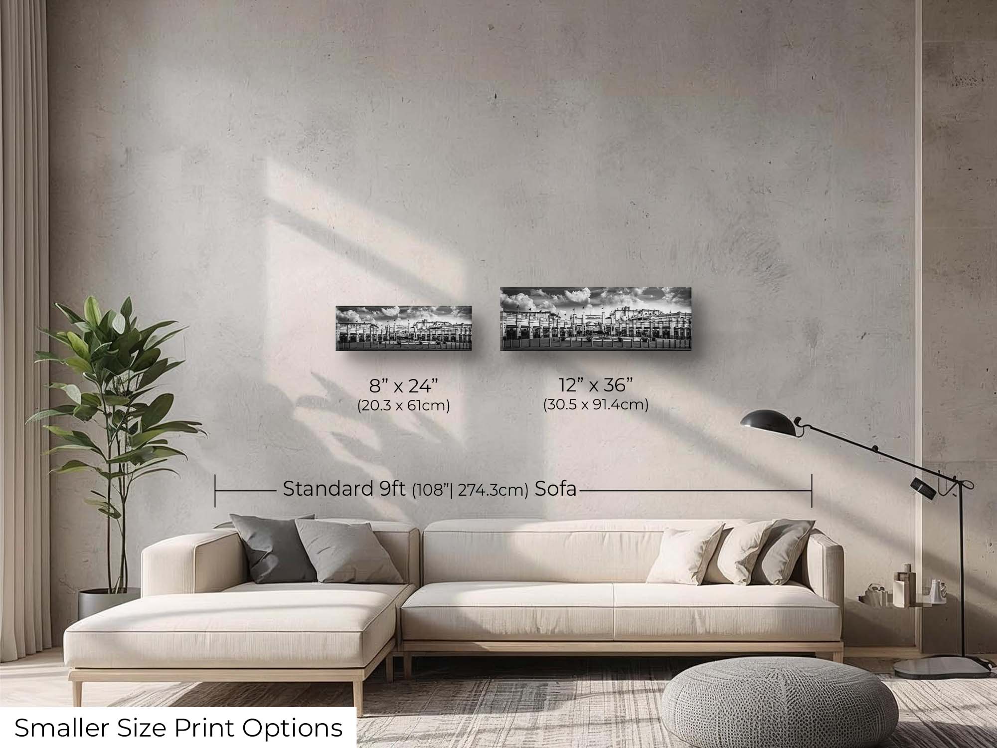 Churchill Downs panoramic black and white fine art print wall art size mockup showing 8x24 and 12x33 inch prints above a nine foot sofa 