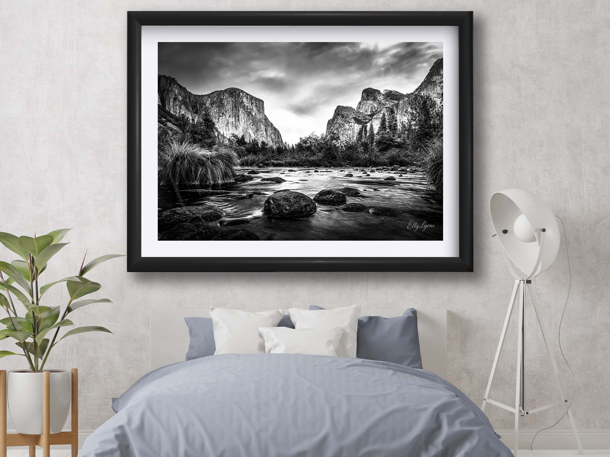 Yosemite National Park, El Capitan black and white fine art print in black frame styled above a bed in a bright bedroom