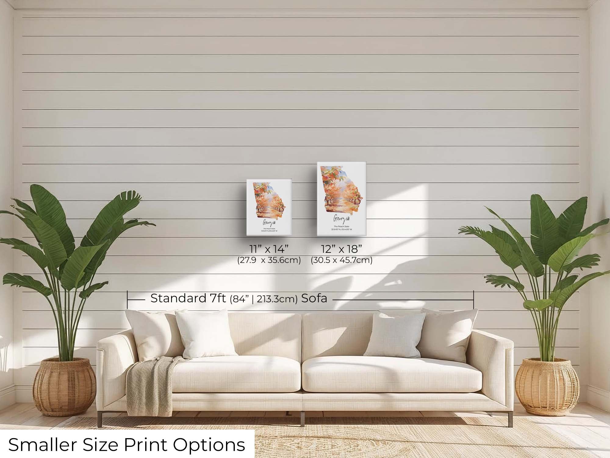 Georgia watercolor state map with a peach tree orchard wall art print wall art size mockup showing 11x14 and 12x18 inch prints above a seven foot sofa 