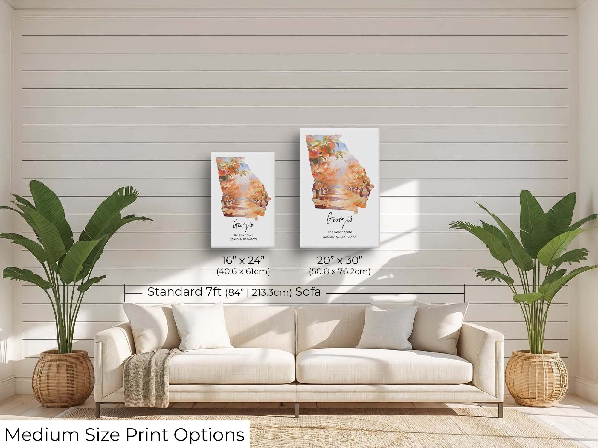 Georgia watercolor state map with a peach tree orchard wall art print wall art size mockup showing 16x24 and 20x30 inch prints above a seven foot sofa 