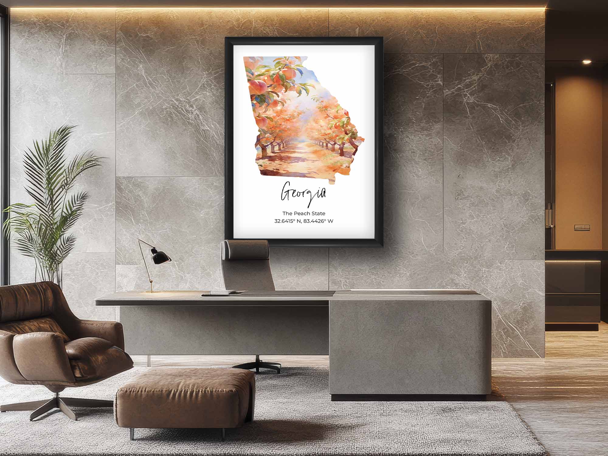Georgia watercolor state map with a peach tree orchard wall art print in black frame styled above a desk and chair in a bright office