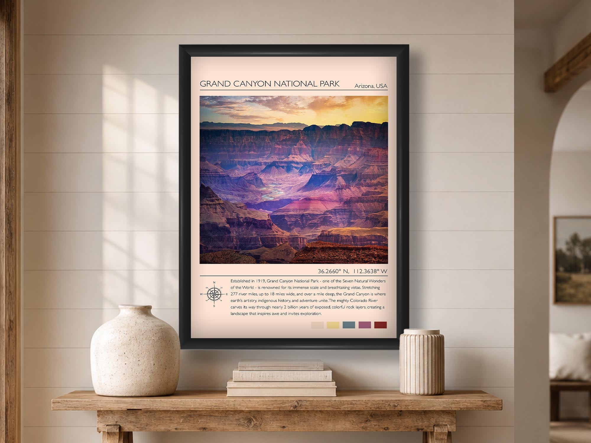Grand Canyon National Park travel poster featuring the Colorado River photograph and photo inspired color palette in black frame styled above a wooden table in a bright entryway