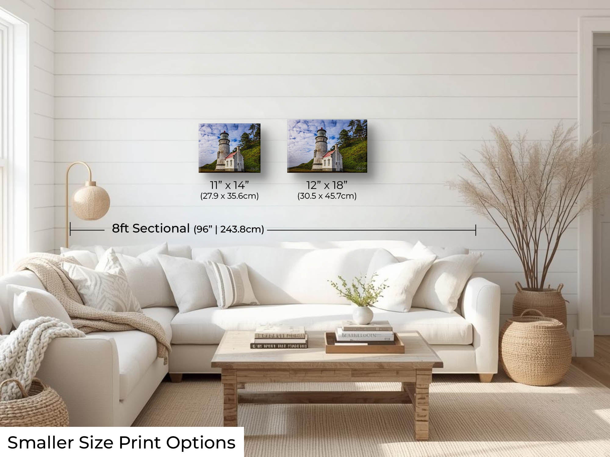 Haceata Head lighthouse fine art print wall art size mockup showing 11x14 and 12x18 inch prints above an eight foot sofa 