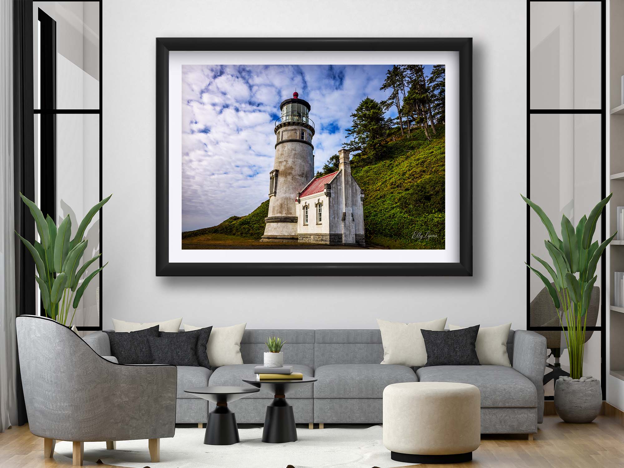 Haceata Head lighthouse fine art print in black frame styled above a sofa in a bright living room