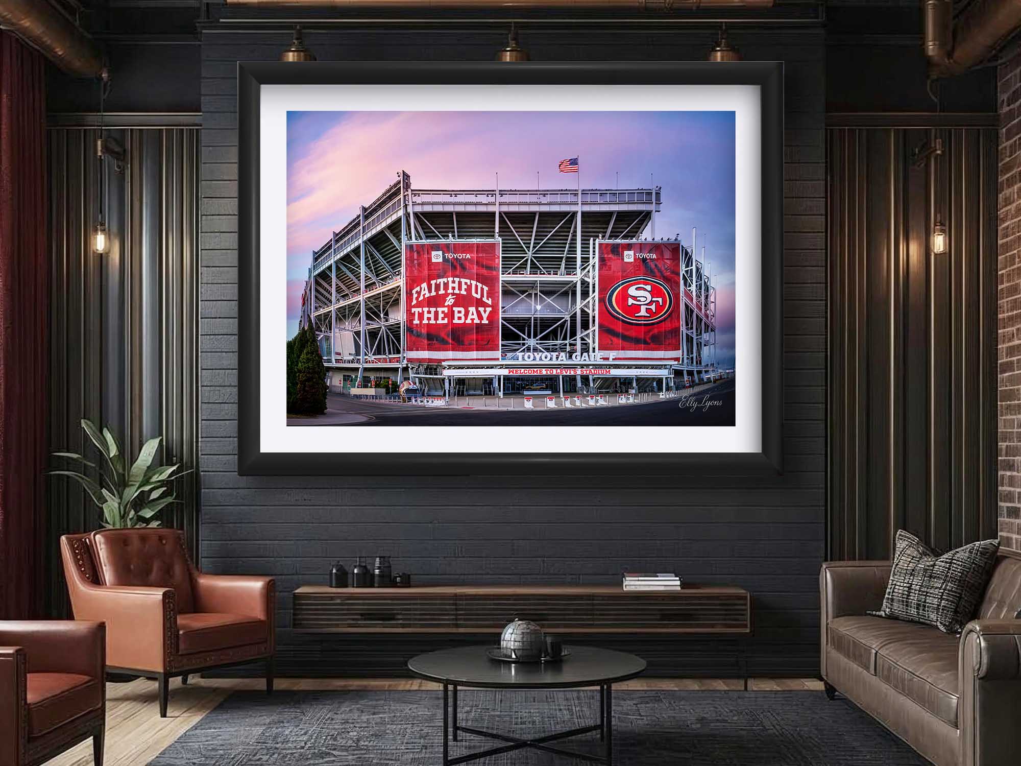 Levi’s Stadium, San Francisco 49ers sunrise fine art print above a coffee table and reading chair in a man cave