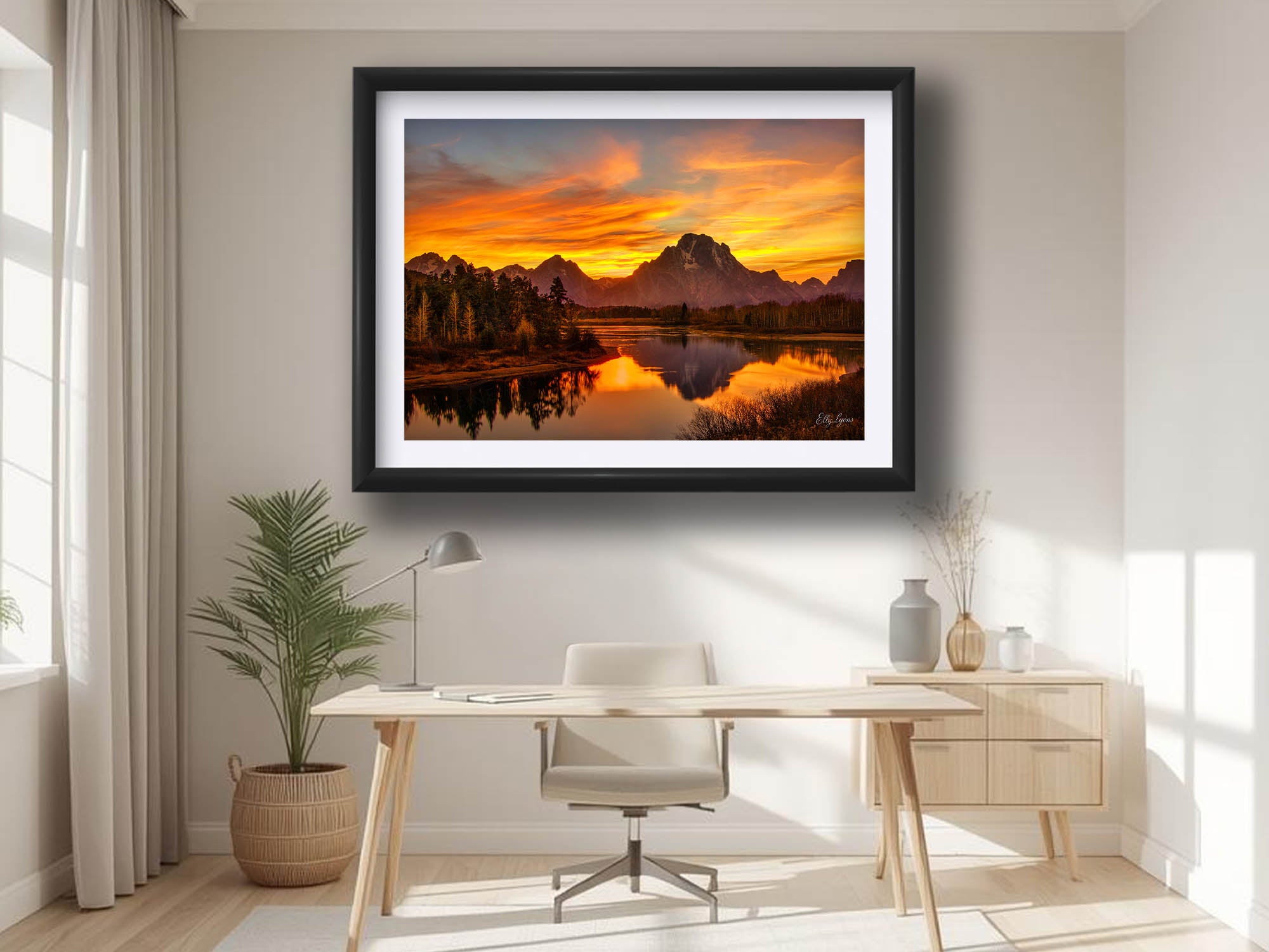 Grand Teton National Park, Oxbow Bend Mount Moran reflection sunset fine art print in black frame styled above a desk and chair in a bright office