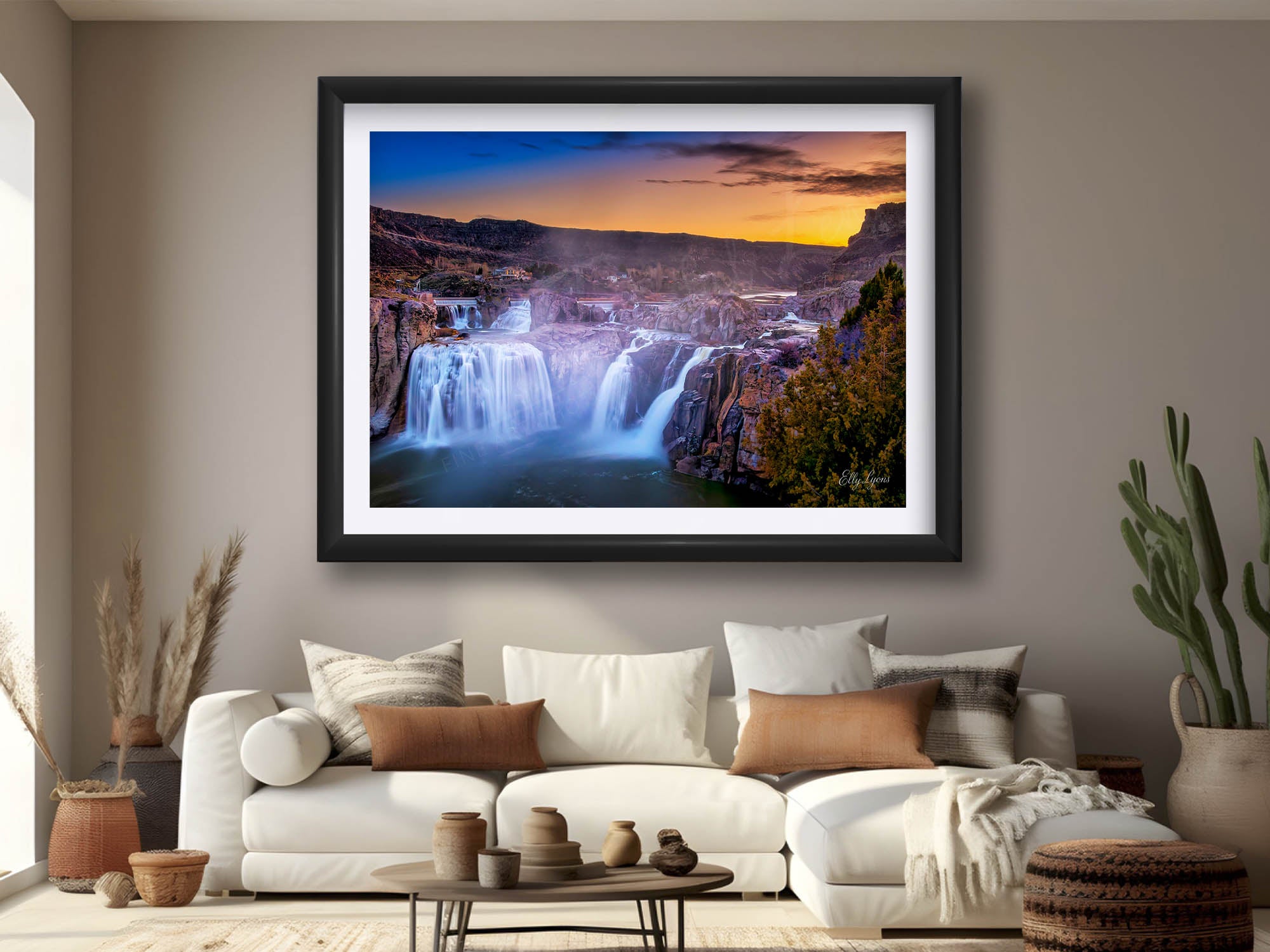 Shoshone Falls sunset, The Niagara of The West fine art print in black frame styled above a sofa in a bright living room