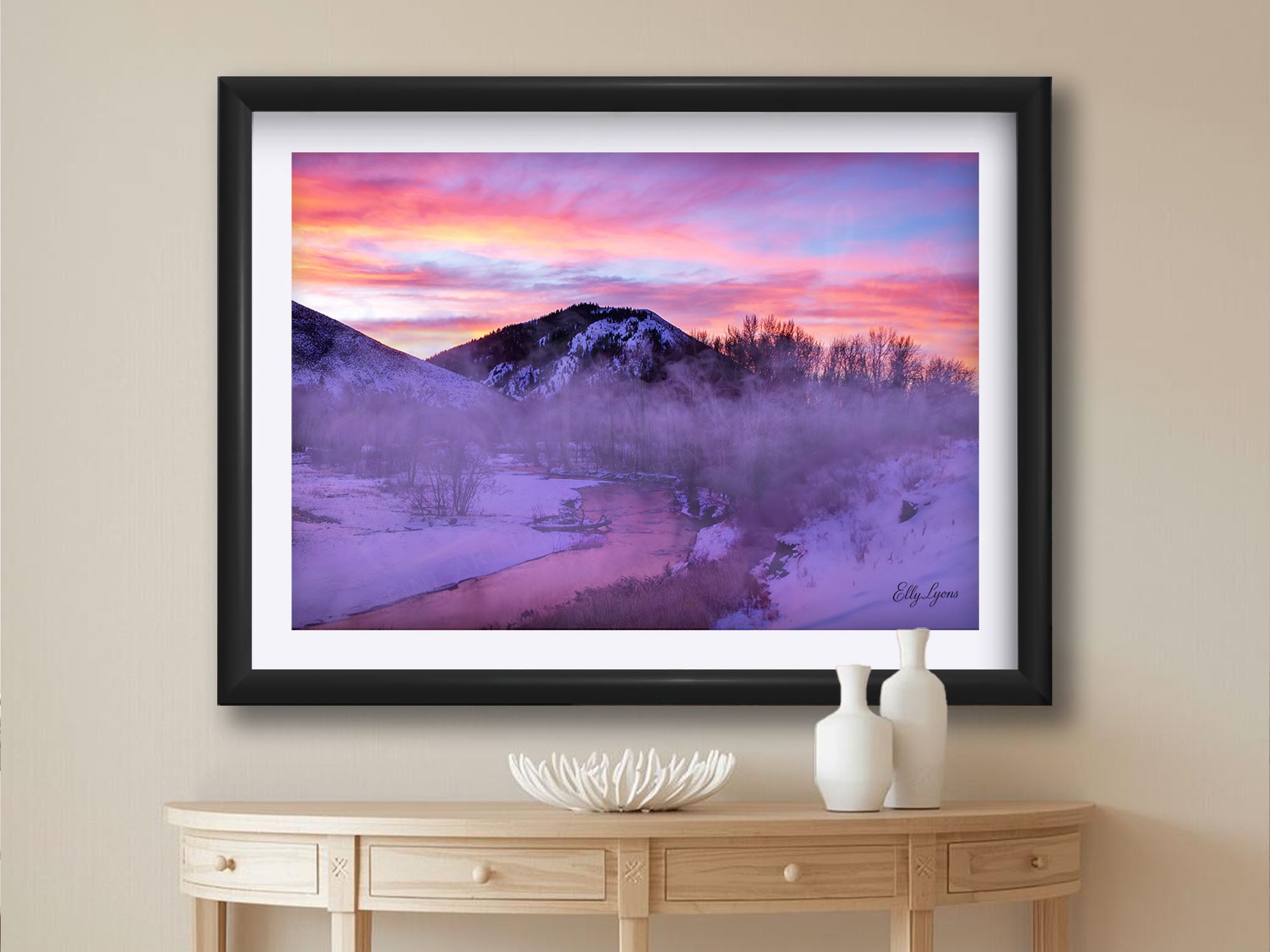Box Car Bend Idaho sunrise fine art print in black frame styled above a table in a bright entryway